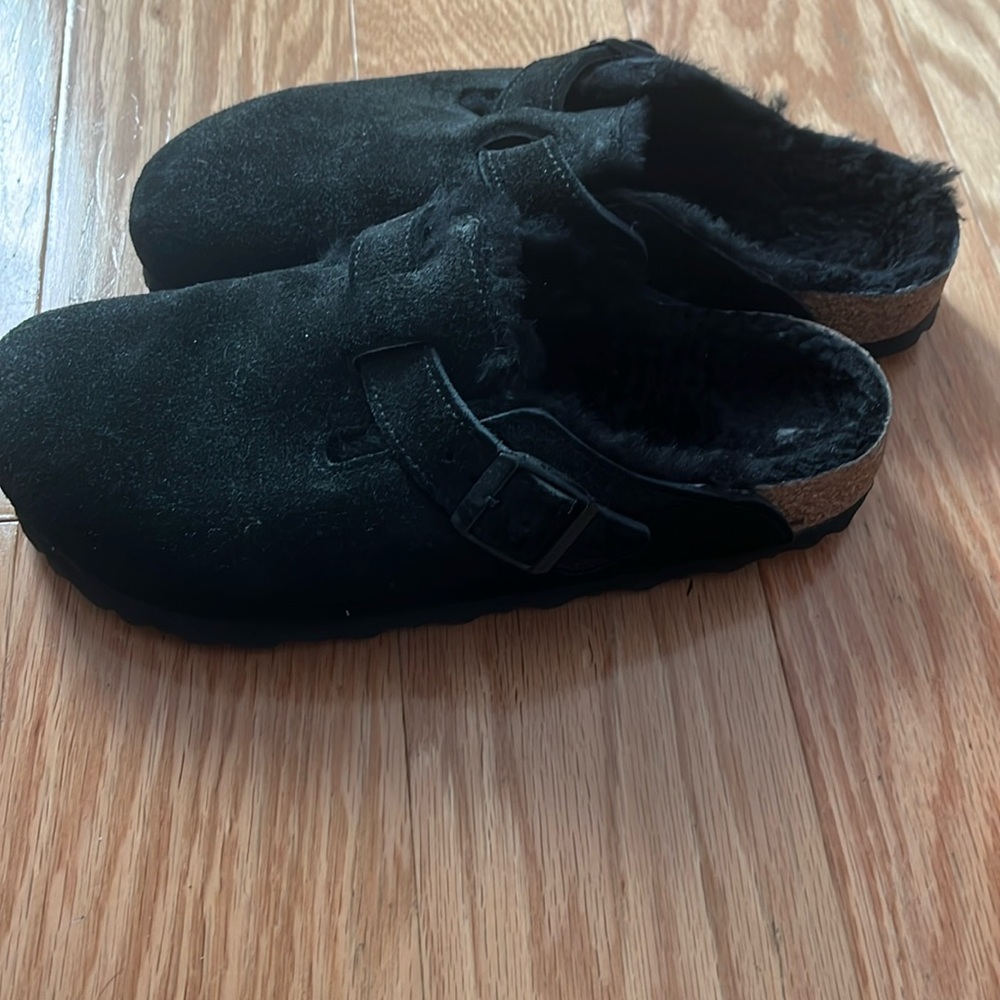 Black shearling Birkenstock clogs